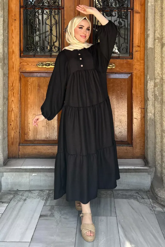 Kol Lastikli Ön Düğme Detaylı Fırfırlı Tesettür Elbise Siyah